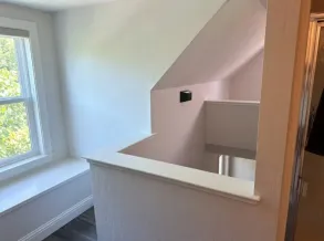 Architectural drywall with curved walls and recessed niches