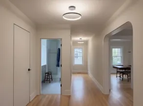 Invisible frameless door built into a drywall wall