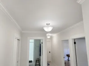 Whole-room surface refinishing to a smooth modern finish