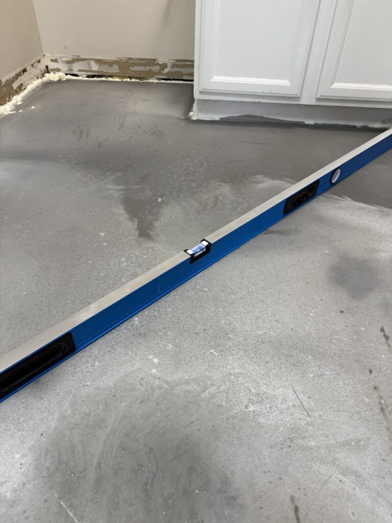 Perfectly leveled concrete subfloor ready for tile installation Perfectly leveled concrete subfloor ready for tile installation