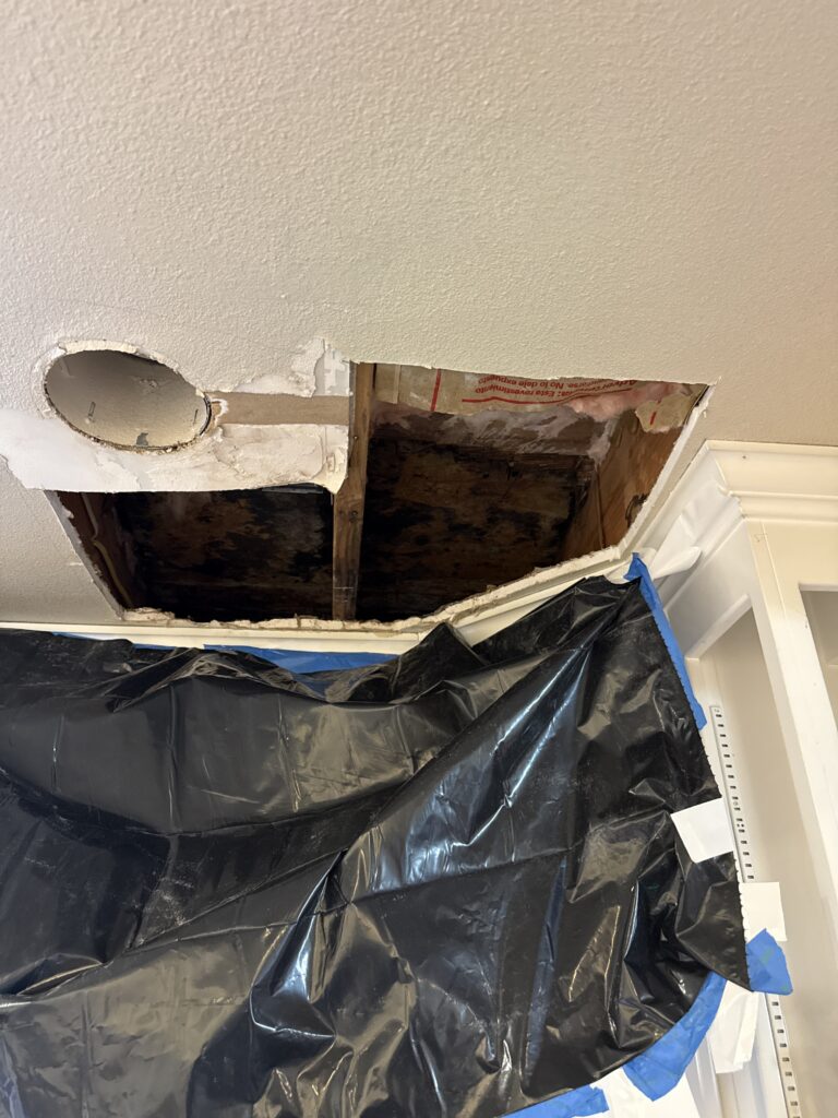 Water damage ceiling hole temporary protection black plastic San Jose
