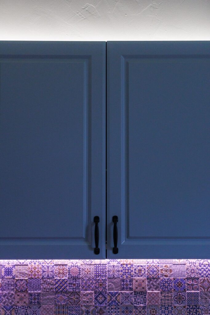 Freshly painted blue kitchen cabinets